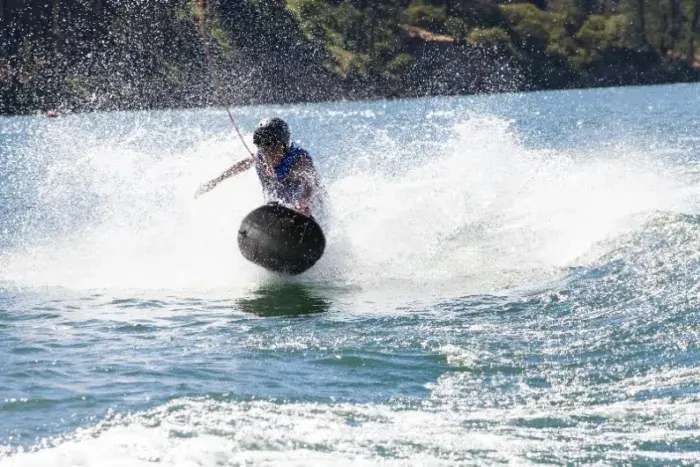 camper jumping on wakeboard