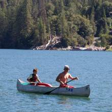 Two campers in a canoe